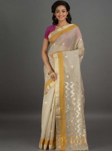 14. Cream chanderi cotton saree with golden and yellow border