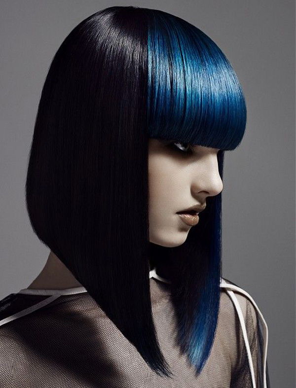 aštrus bob contrasts with blunt electric blue fringe