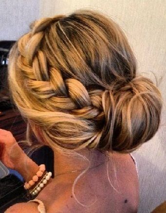 The heavy braided bun updo hairstyle