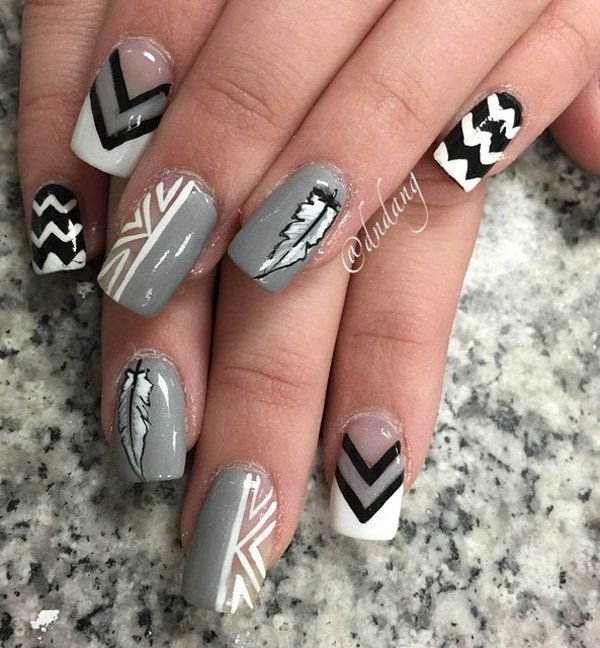 Gary and white feather nail art