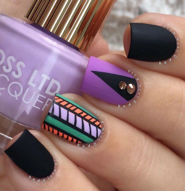 Fekete and purple with tribe nail art