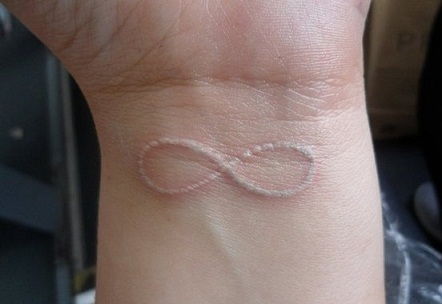 Infinity pattern white Tattoo Design